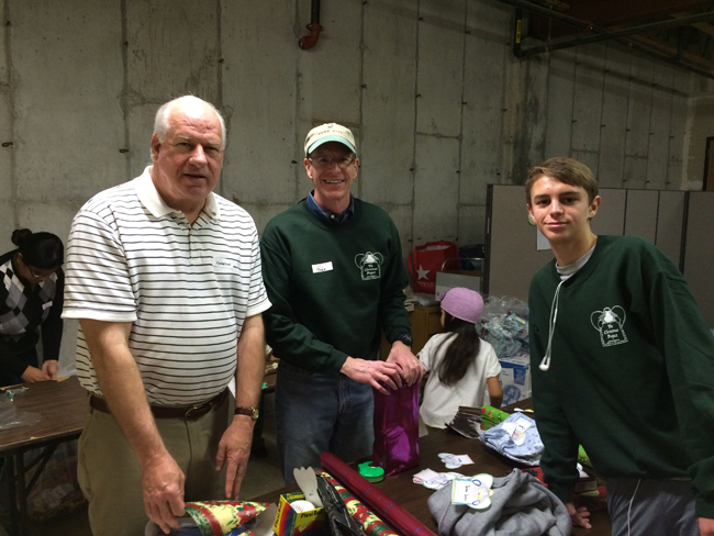 Volunteers handing out presents